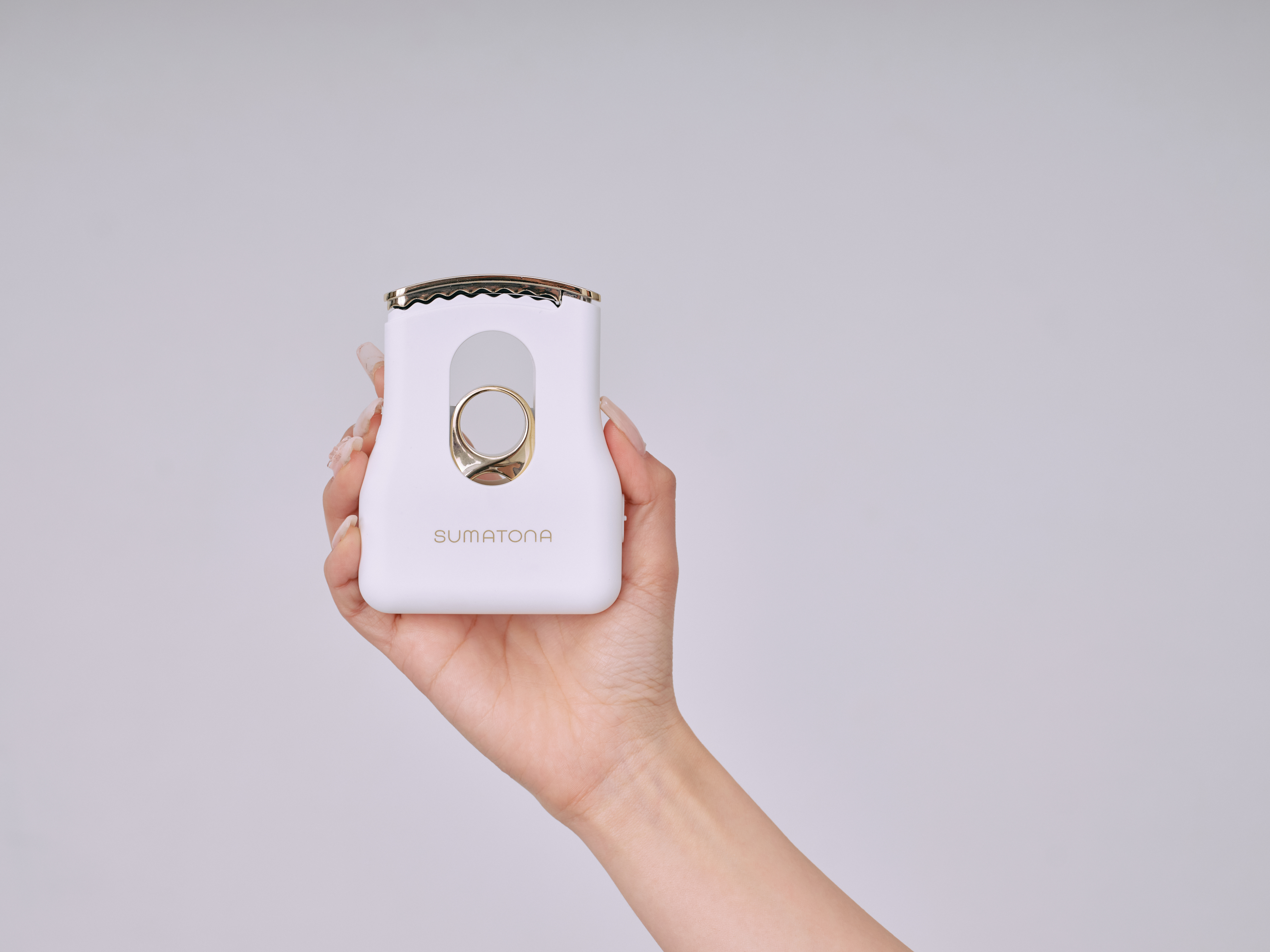 Smart Mini — fits in one hand, 132g palm-sized